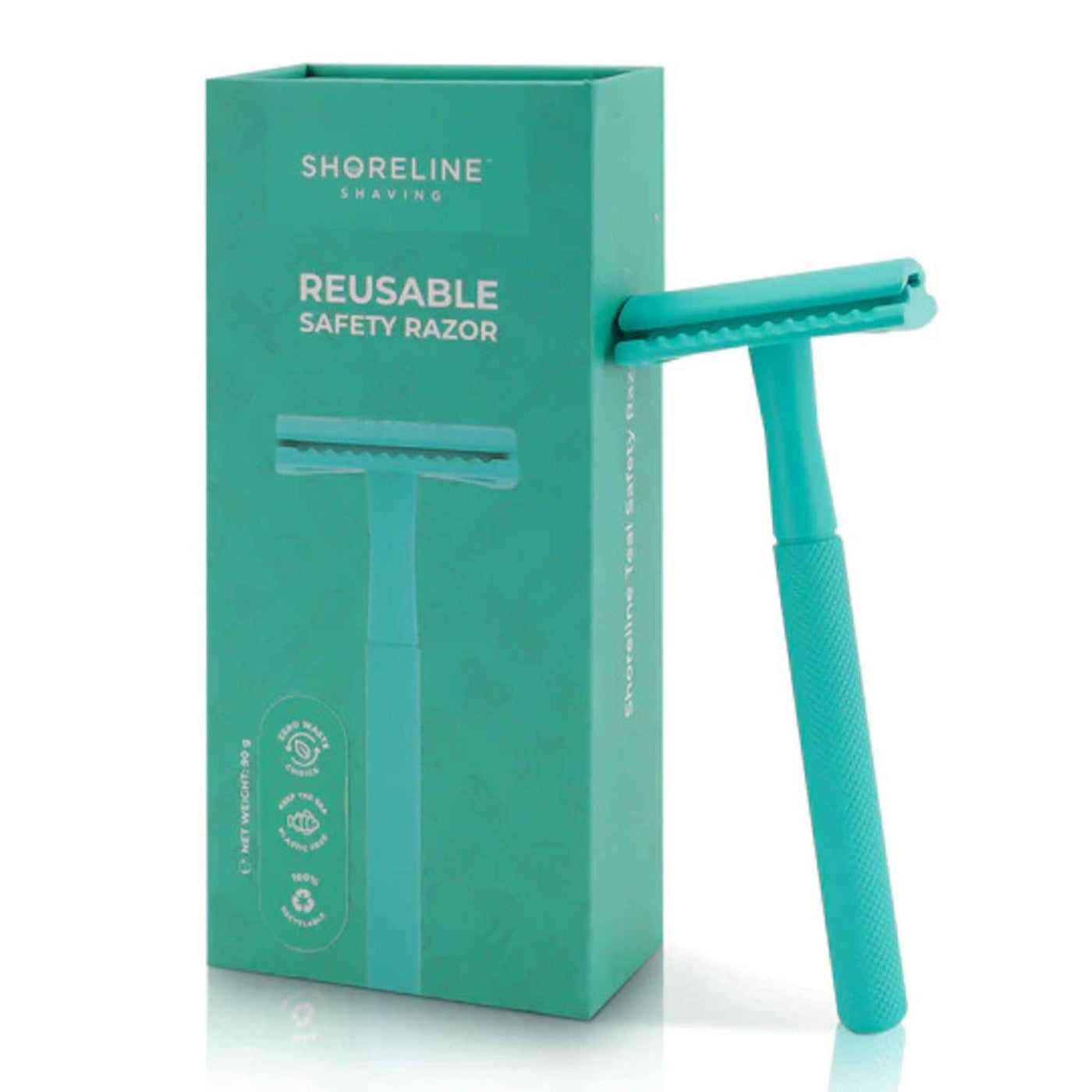 Teal Safety Razor Leaning On Gift Box